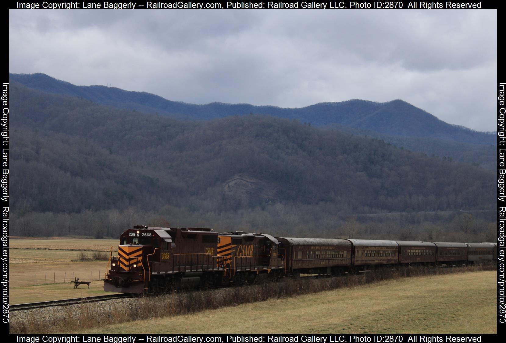 GSMR 2668, GSMR 1751 is a class EMD GP38-2, GP7 and  is pictured in Bryson City, North Carolina, United States.  This was taken along the Murphy Branch on the Great Smoky Mountain . Photo Copyright: Lane Baggerly uploaded to Railroad Gallery on 01/05/2024. This photograph of GSMR 2668, GSMR 1751 was taken on Thursday, December 28, 2023. All Rights Reserved. 